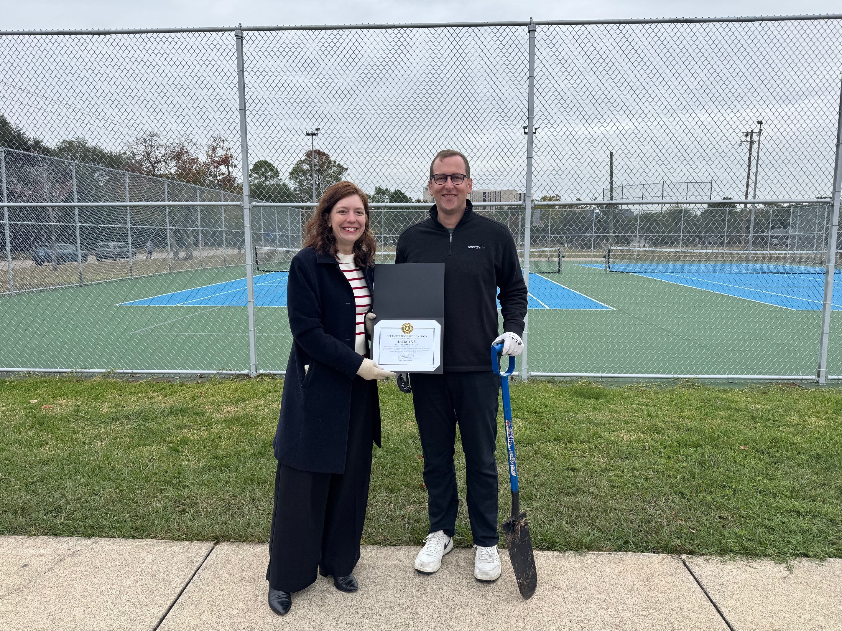 Kara Cook-Schultz presenting certificate to Ryan Brown
