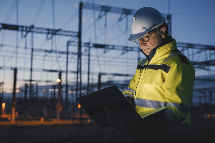 engineer at substaion at night