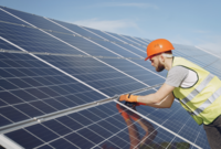 engineer installing solar panel