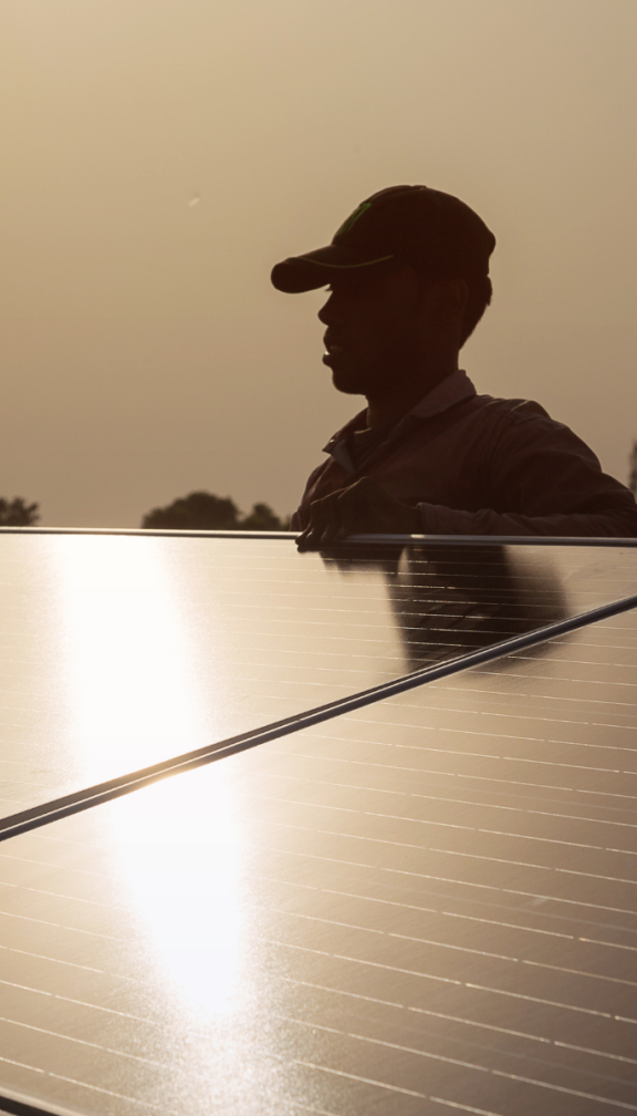 engineer installing solar panel