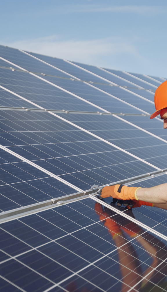 engineer installing solar panel